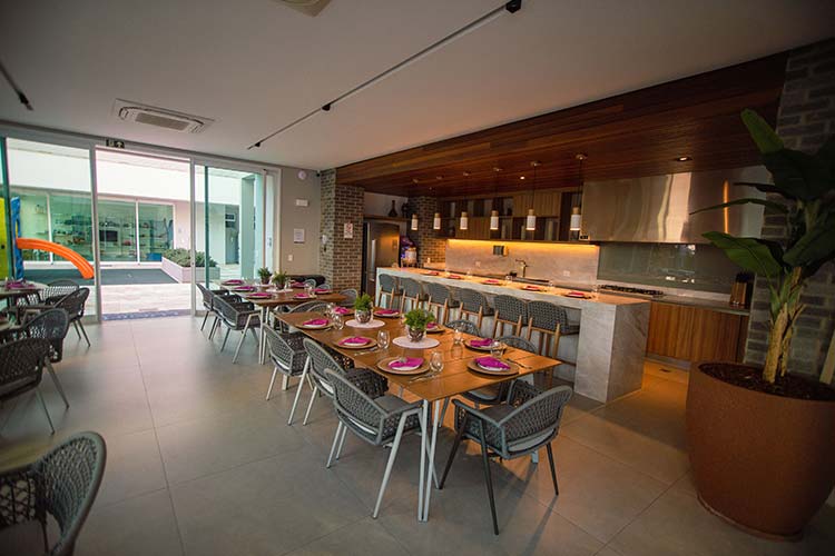 Synchronized clock system installed in a cafeteria dining area
